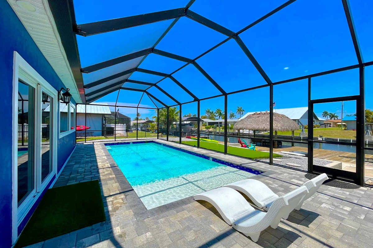 Screened heated pool and lanai at Waterfront Villa with Heated Pool, Cape Coral FL